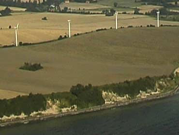 Escarpment with four wind turbines